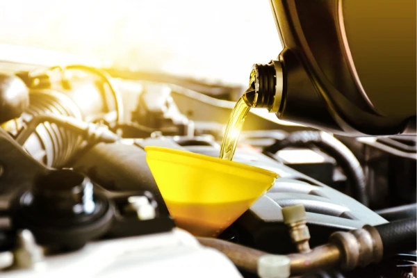 Routine oil change and vehicle inspection at Amin Garage, Faqir Wali